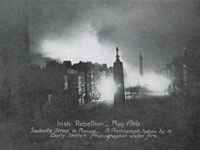TCD, MS 5870/29 Postcard of Sackville Street in flames.